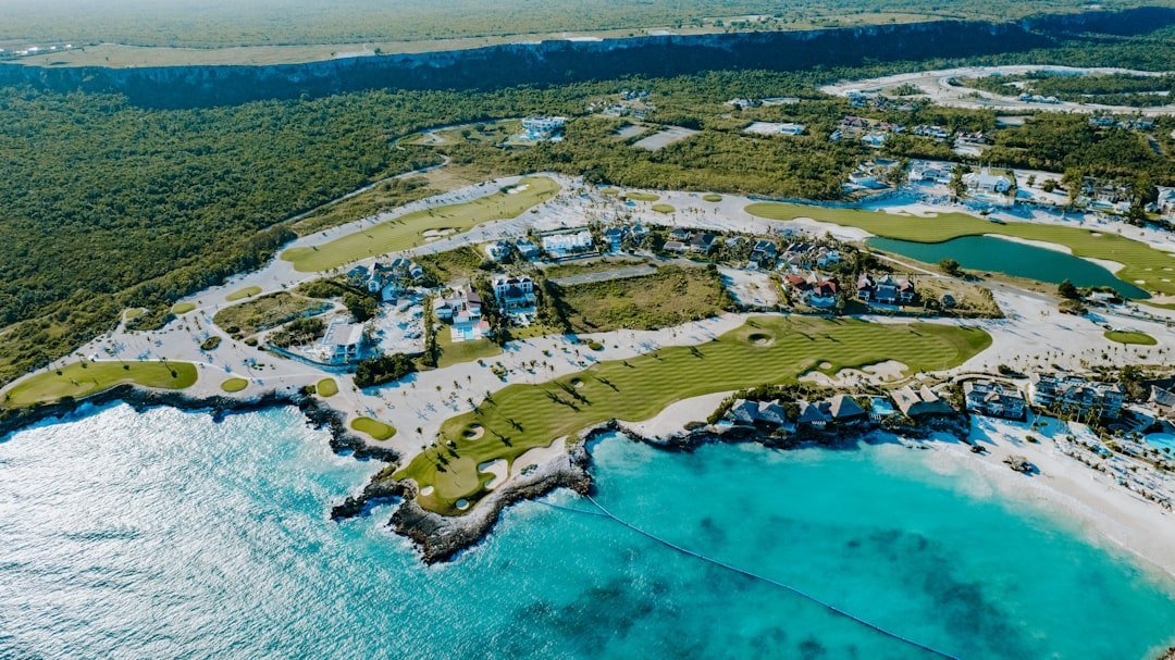 kinh tế trải nghiệm Cần Giờ — minh họa golf course coastal resort aerial green