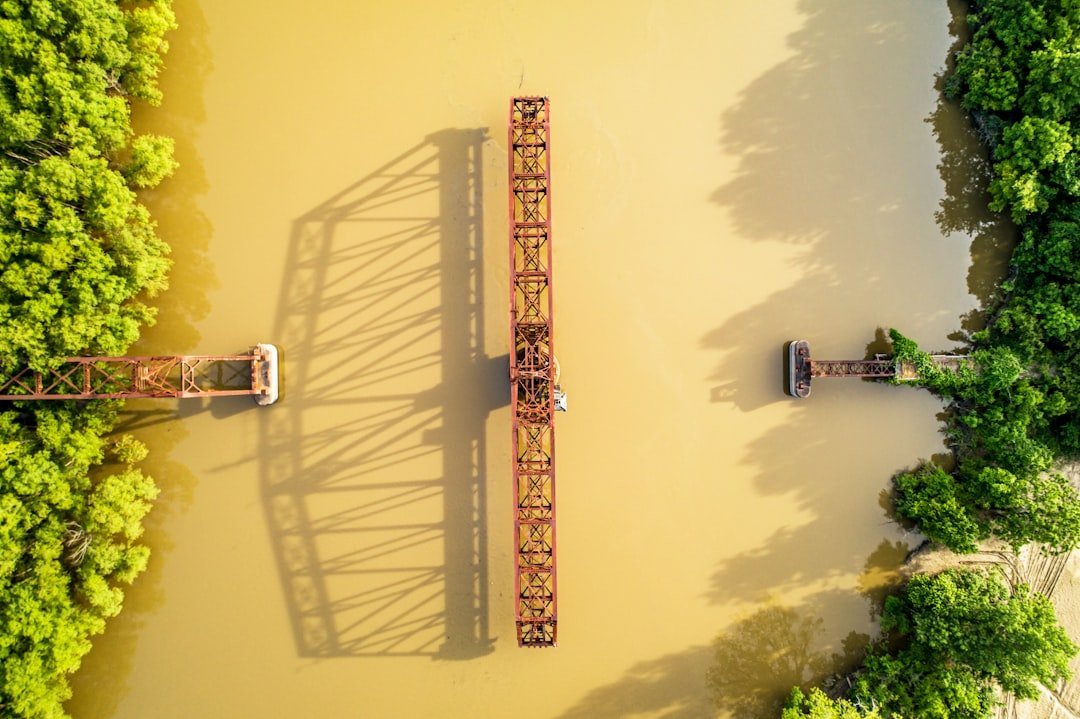 nhà thứ hai Vinhomes Cần Giờ — minh họa modern cable-stayed bridge construction river aerial view