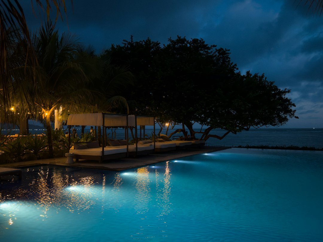 kinh tế lễ hội Vinhomes Cần Giờ — minh họa luxury beachfront resort hotel pool night lights