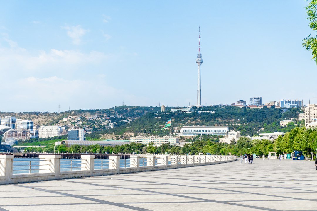 sống xanh Vinhomes Cần Giờ — minh họa modern waterfront promenade trees walkway coastal city