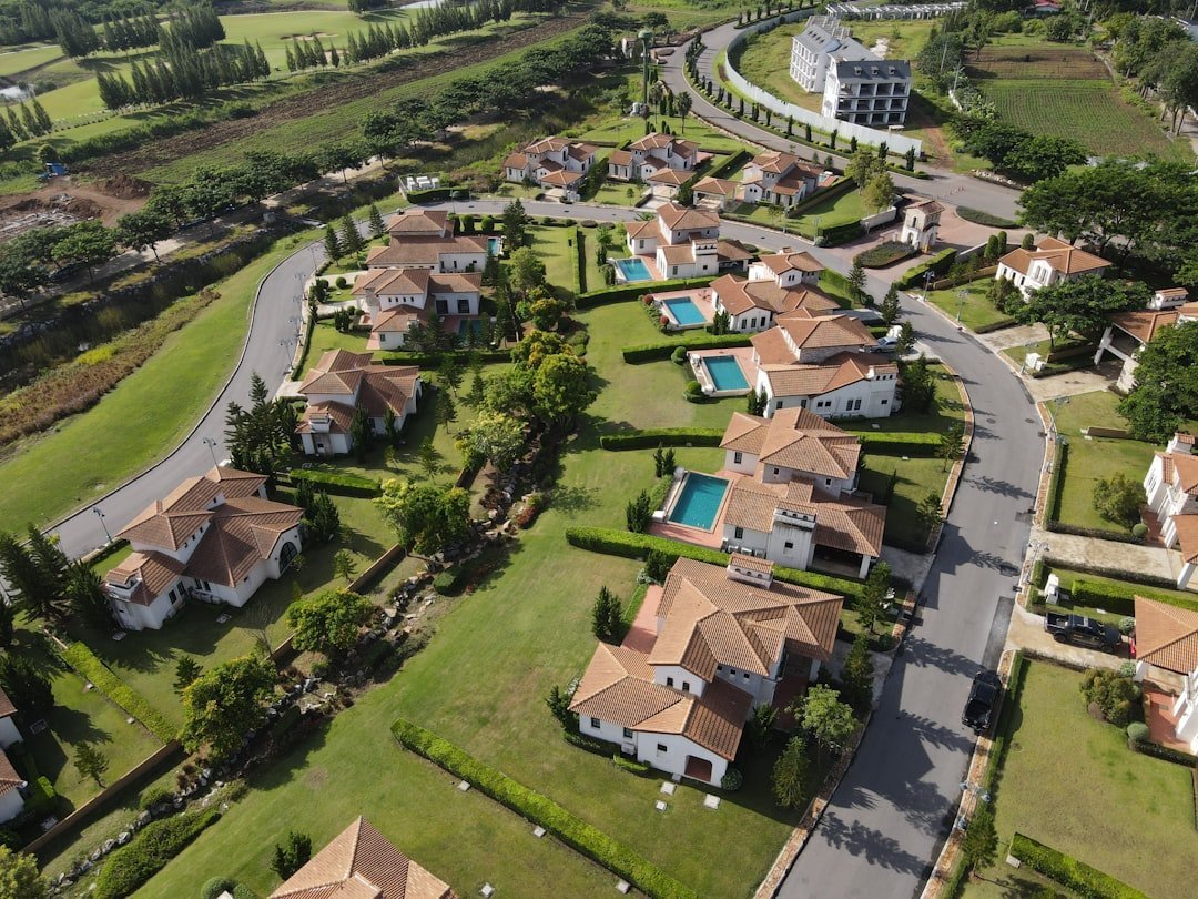 thuế nhà đất thứ hai — minh họa coastal villa residential community aerial view